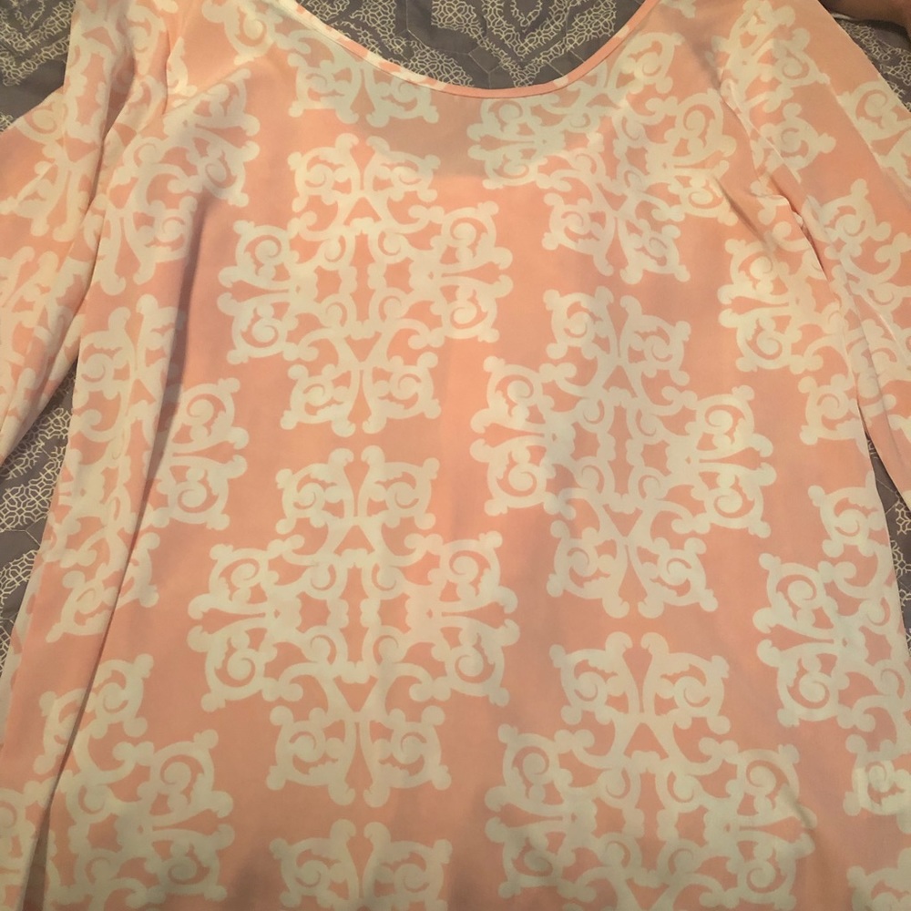 Pink/white sheer blouse with a bow. 3/4 sleeves